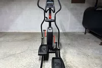 The Schwinn 411 Compact Elliptical Machine on a concrete floor