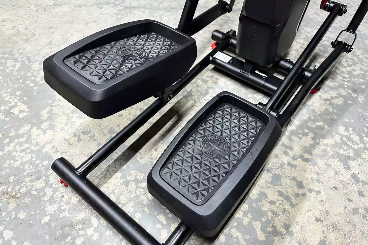 The foot pedals on the Schwinn 411 Compact Elliptical Machine