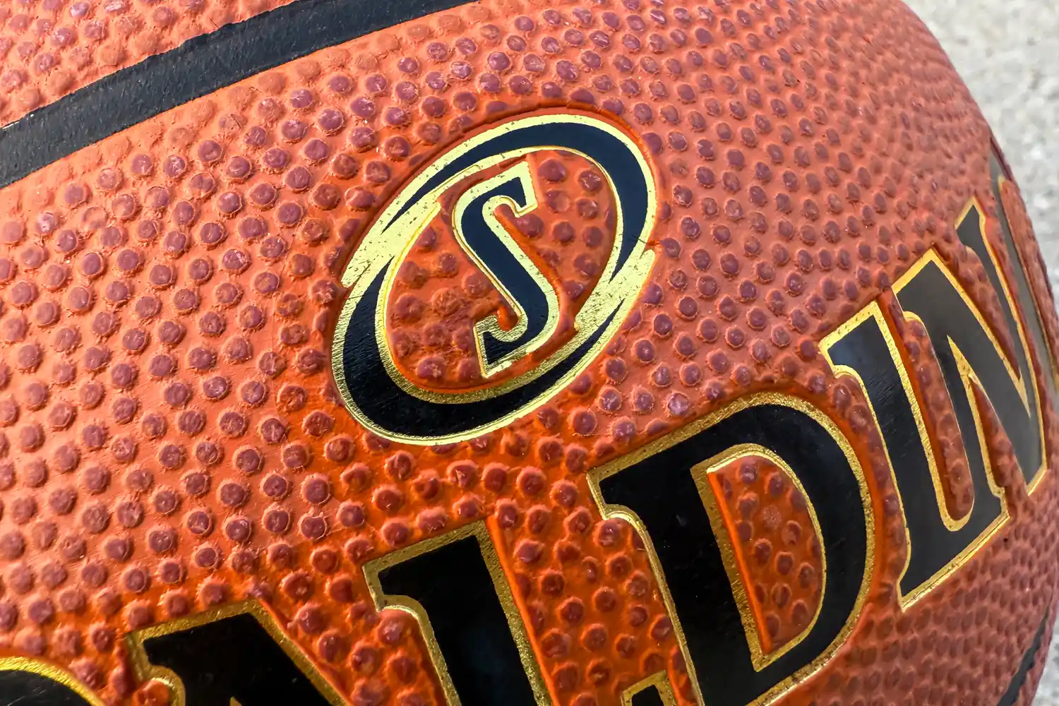 A close-up of the texture on the Spalding Street Outdoor Basketball