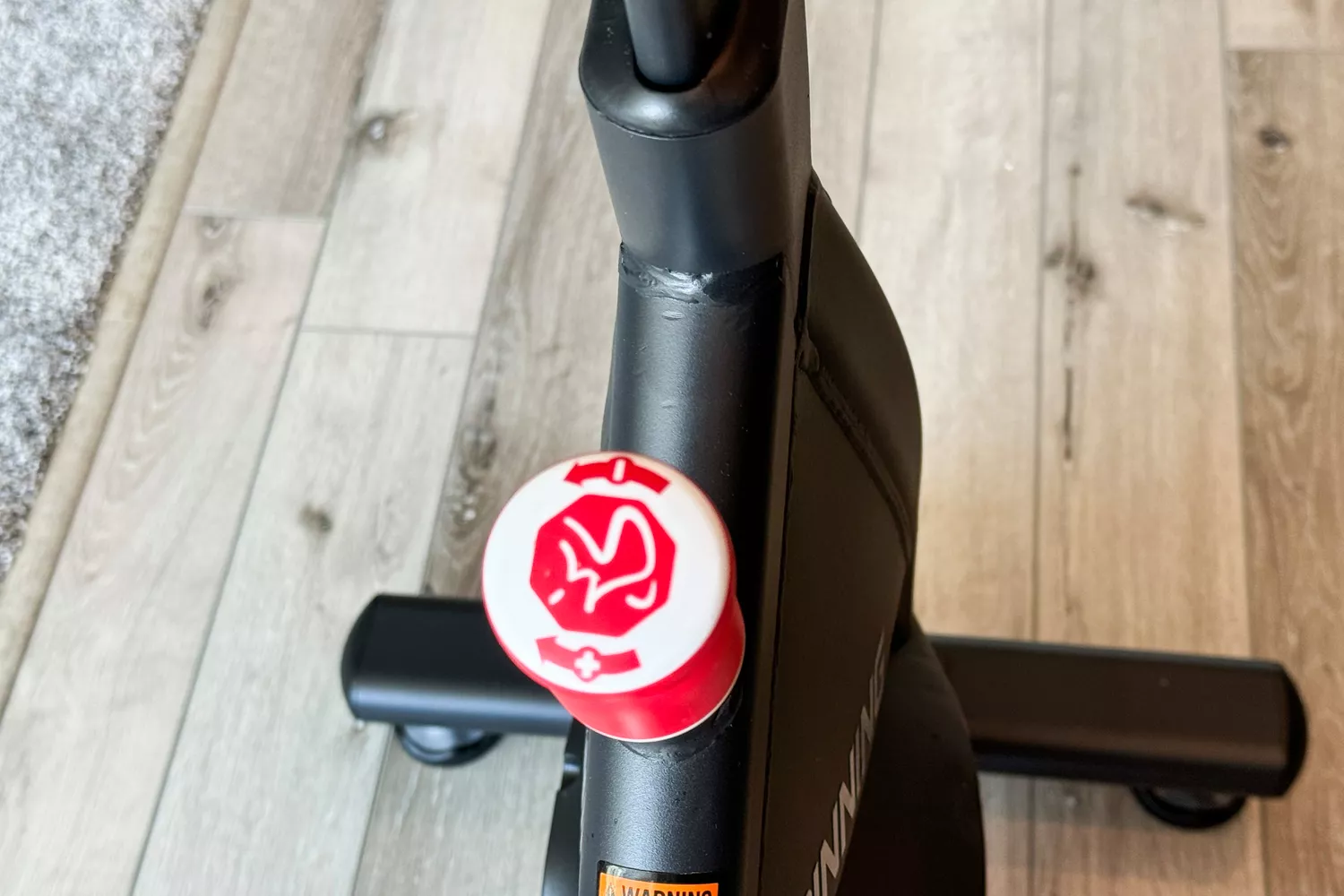 The adjustable resistance dial on the Spinning Aero Connected Spinner Bike