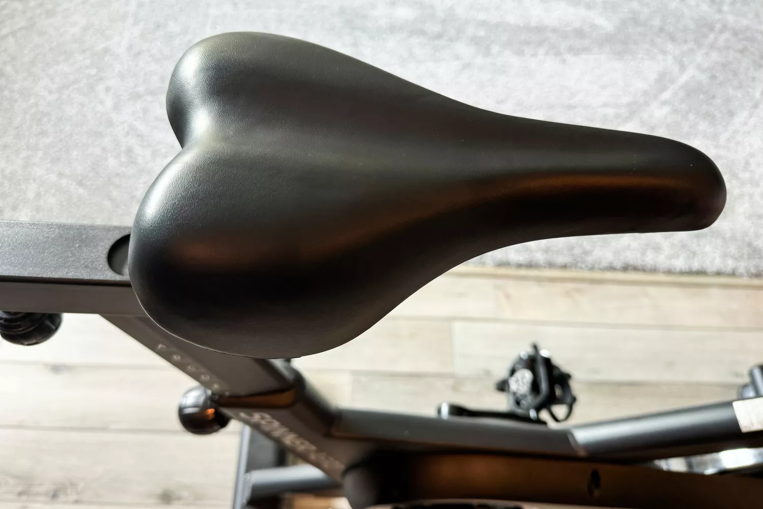 The adjustable seat on the Spinning Aero Connected Spinner Bike