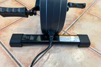 The base of the Sunny Health & Fitness SF-B0960 Motorized Electric Under Desk Bike