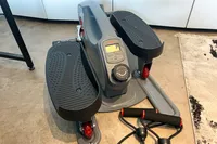 The dial and digital display on the Sunny Health & Fitness Smart Stand/Sit Mini Elliptical Exercise Trainer