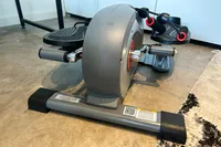 The back of the Sunny Health & Fitness Smart Stand/Sit Mini Elliptical Exercise Trainer