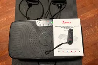 The Sunny Health & Fitness Fitboard 2D Vibration Platform With Resistance Band with manual and remote control