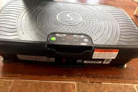 The texture on top of the Sunny Health & Fitness Fitboard 2D Vibration Platform With Resistance Band