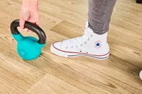 Person working out in Converse Chuck Taylor All Star Sneakers