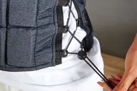 Person pulling strings on Hyperwear Hyper Vest Fit Weighted Vest for Women