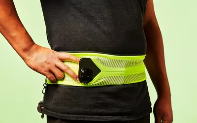 iPhone poking out of a waistband phone holder