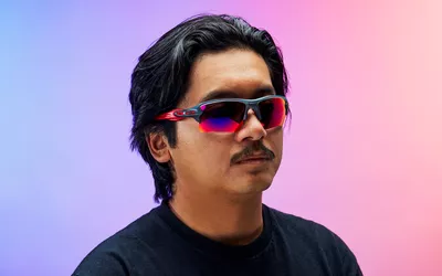 A person wearing sports sunglasses