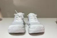 The front of a pair of Topo Athletic Women's Atmos Running Shoes