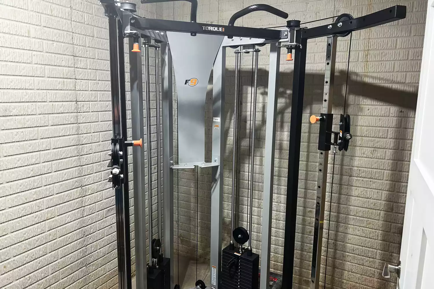 A front view of the Torque Fitness Free-Standing F9 Fold Away Functional Trainer