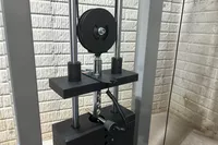 A close-up of the pulley and weight stacks of Torque Fitness' Free-Standing F9 Fold Away Functional Trainer
