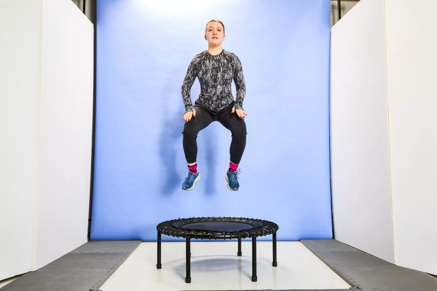 A person in the air above the bellicon 39 Inch Mini Trampoline
