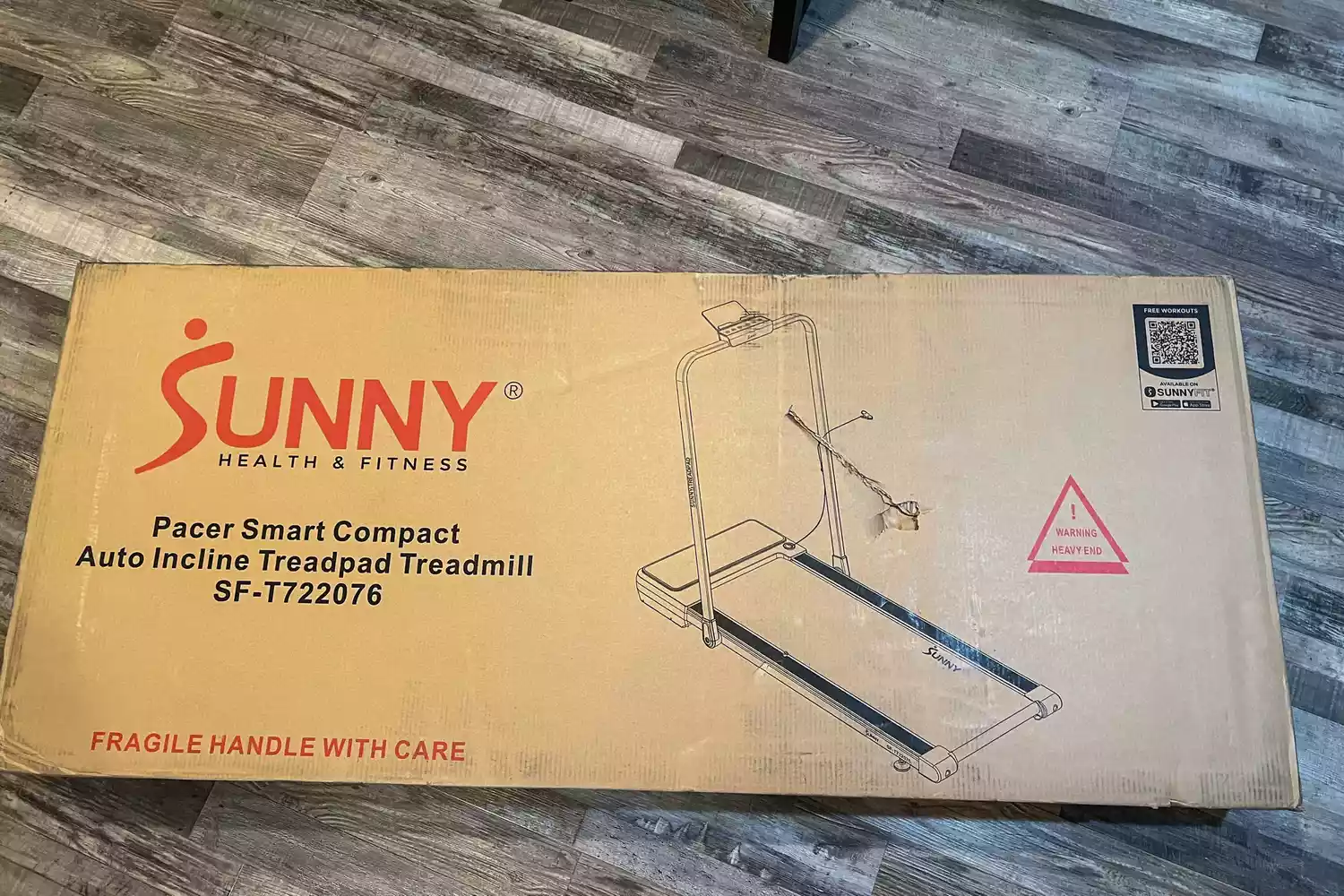 The Sunny Health & Fitness Pacer Smart Compact Auto Incline Treadpad Treadmill box