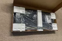 The UREVO Walking Pad Under Desk Treadmill in its original packaging