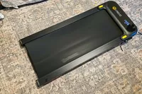 The Urevo SpaceWalk 3S Treadmill on a rug