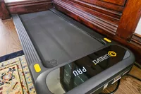 The Urevo SpaceWalk 3S Treadmill on a wooden floor