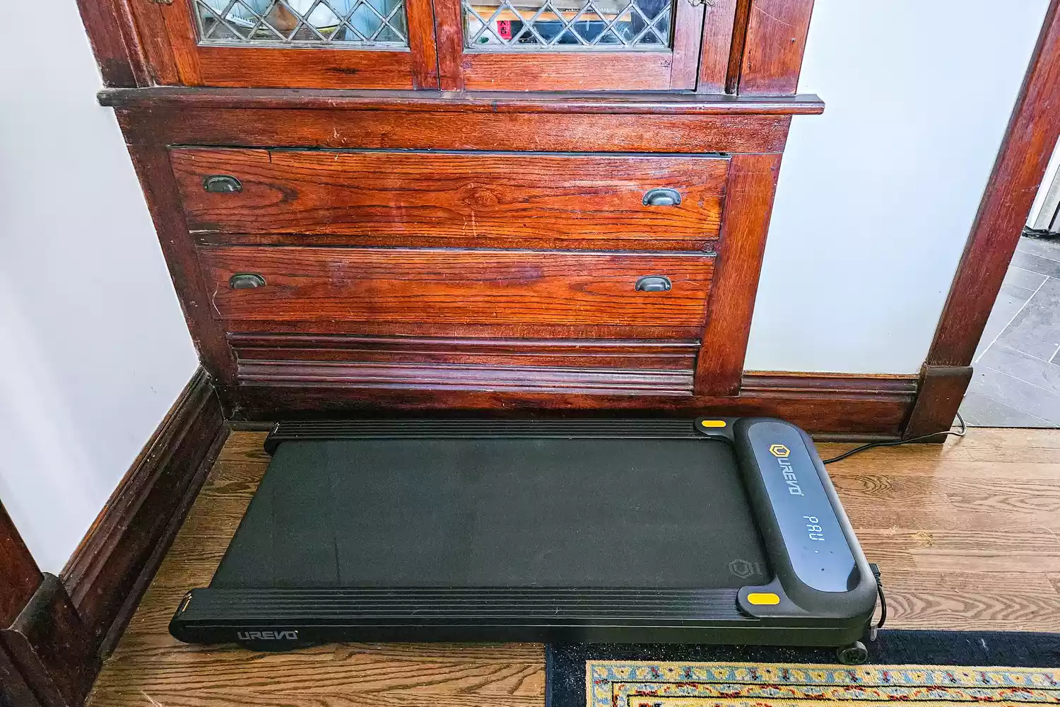 The Urevo SpaceWalk 3S Treadmill on a wooden floor