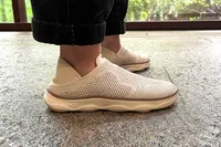 A side view of a person wearing the Vionic Women's Sage RX Recovery Slip-On Shoes