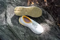 The Vionic Walk Max Sierra Sneakers on a rock