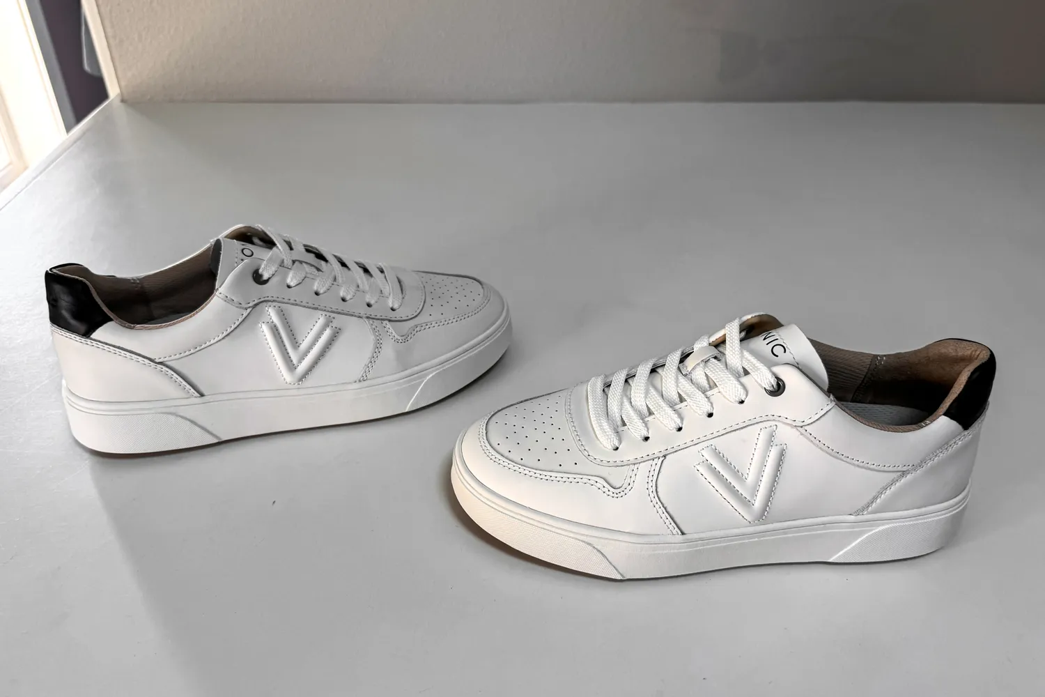 A side view of a pair of Vionic Women's Kimmie Court Sneakers