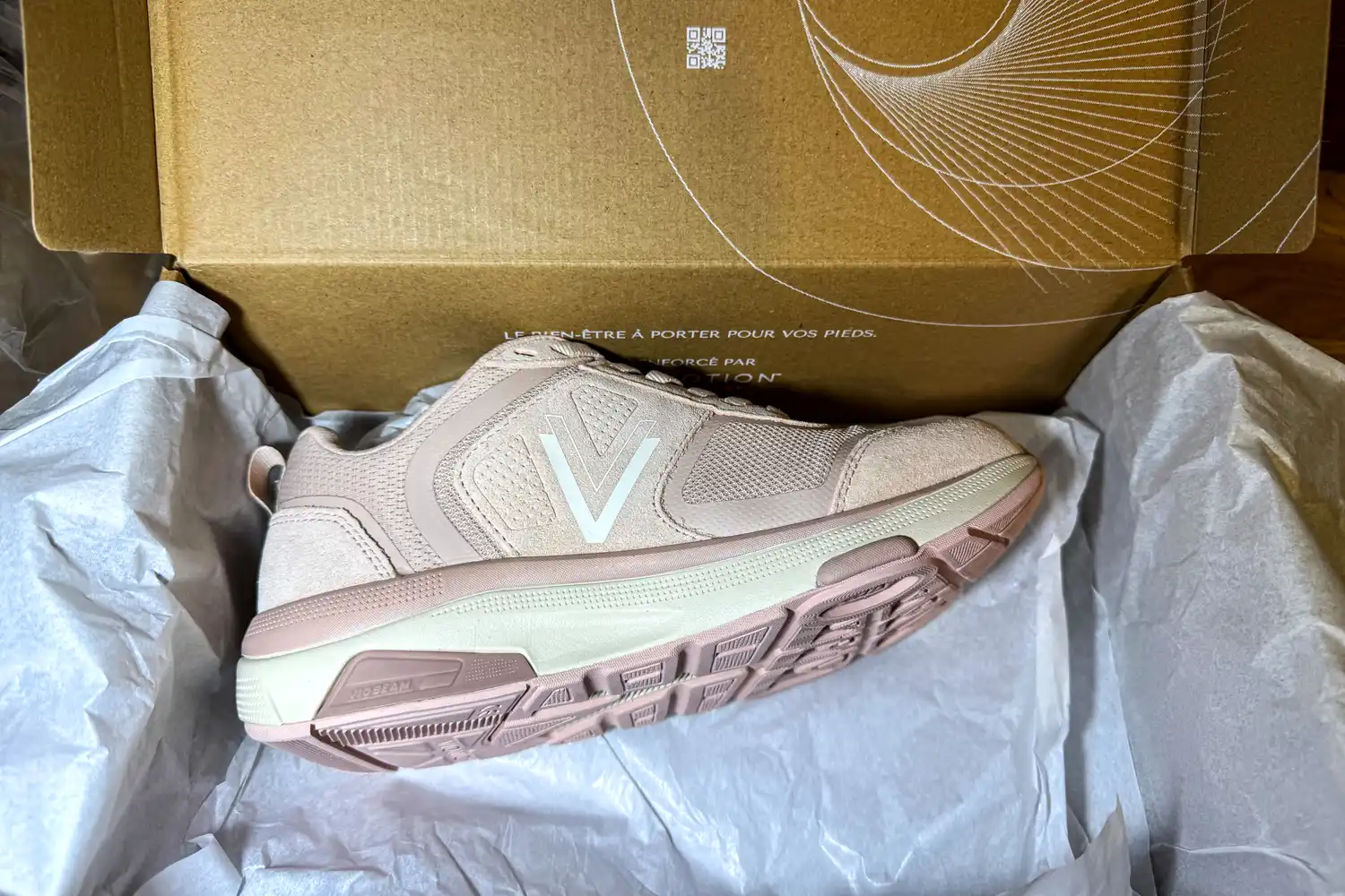 A single Vionic Women's Walk Strider Sneaker inside a shoebox