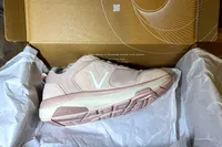 A single Vionic Women's Walk Strider Sneaker inside a shoebox