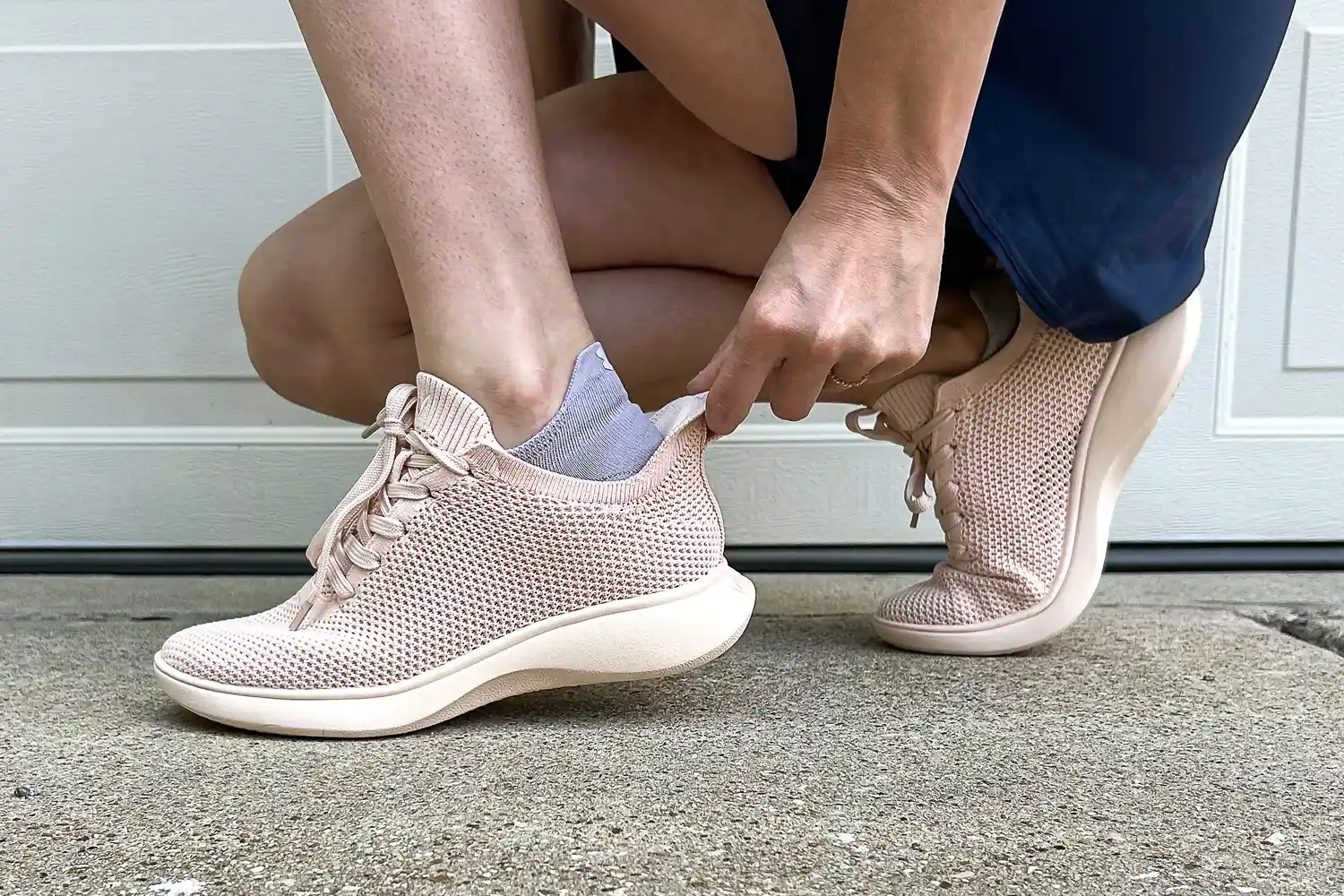 A side view of a person wearing the Vivaia Unisex Urban Sneaker Sliders