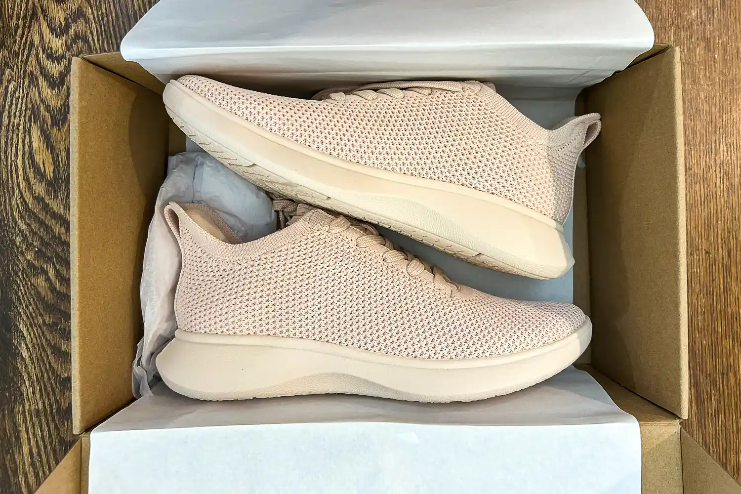 A pair of Vivaia Unisex Urban Sneaker Sliders in a shoebox