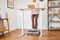 A person walking on the Egofit Walker Pro-M1 Treadmill