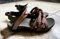 Teva Women's Tirra Sandals sitting on tile floor