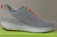 The Aetrex Danika Arch Support Sneaker on top of its box