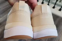The logo on the back of the Vionic Women's Walk Strider Sneakers