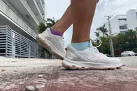 Feet wearing Ryka Devotion X Walking Shoe outdoors