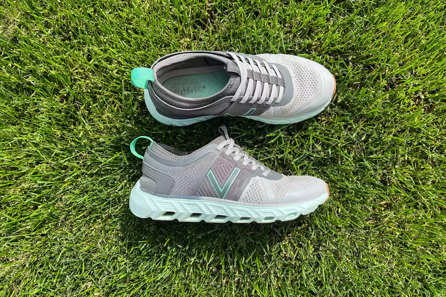 The Vionic Captivate sneakers posed in grass