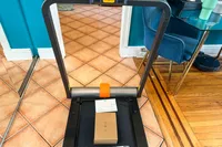 The WalkingPad MC11 Workout Treadmill on a tiled floor