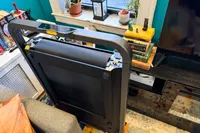 The WalkingPad MC11 Workout Treadmill folded vertically