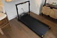 The WalkingPad R3 Hybrid Foldable Treadmill on a wooden floor