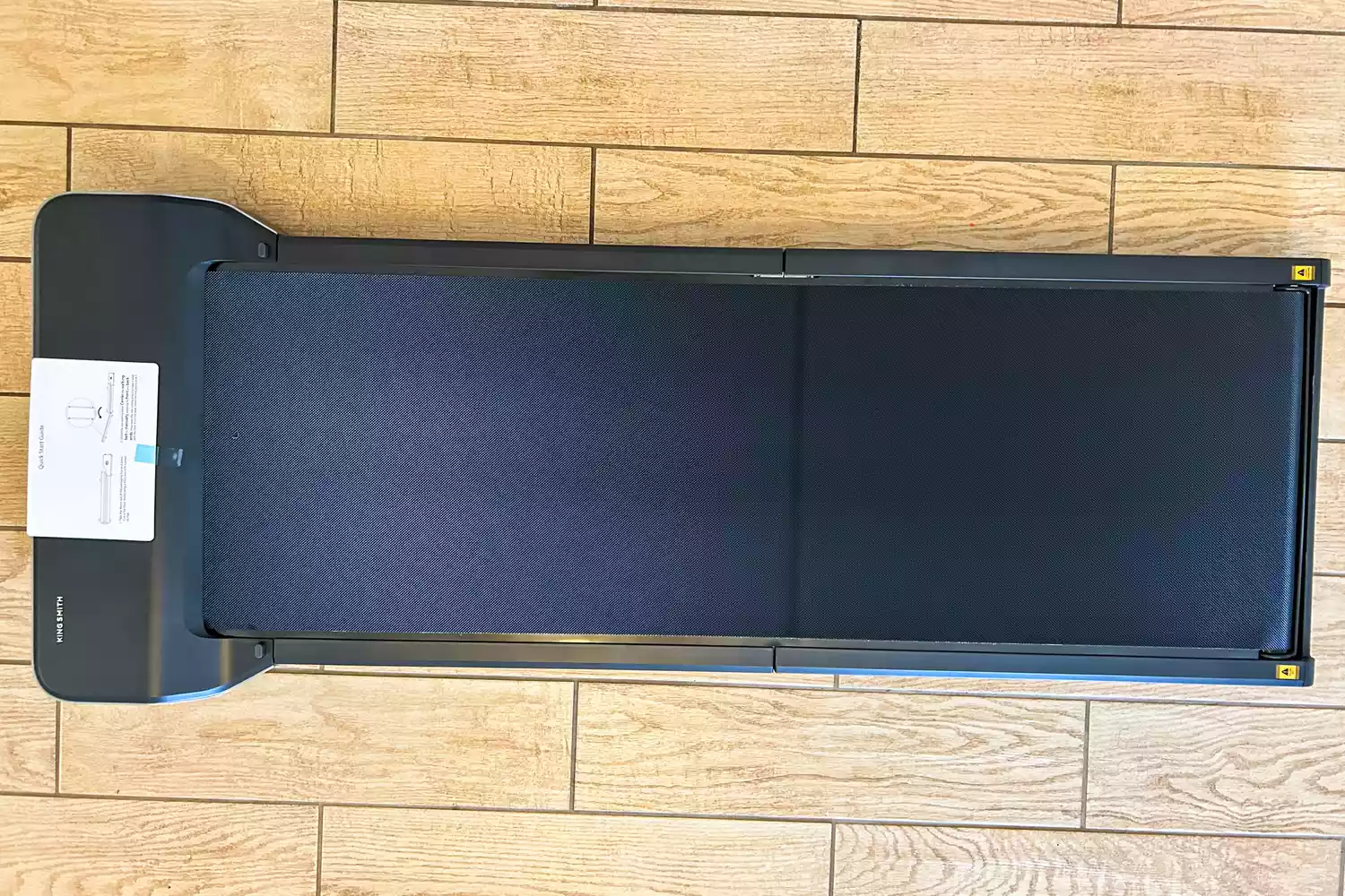 The WalkingPad Z1 Folding Under Desk Treadmill unfolded on a wooden floor