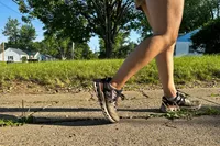 A side view of the On Women's Cloudrunner 2 Running Shoes
