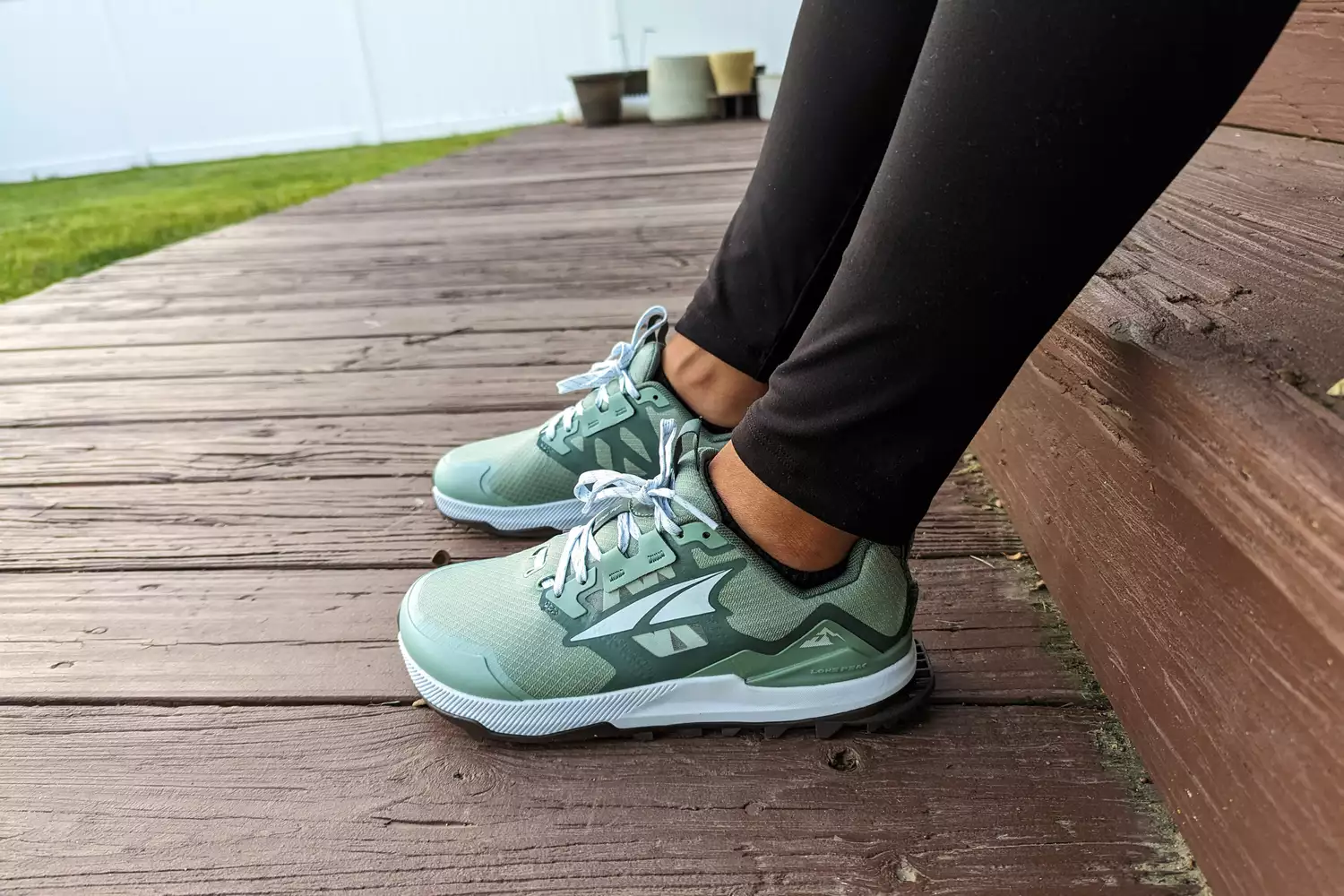 The Altra Lone Peak 8 Trail Running Shoes worn outside