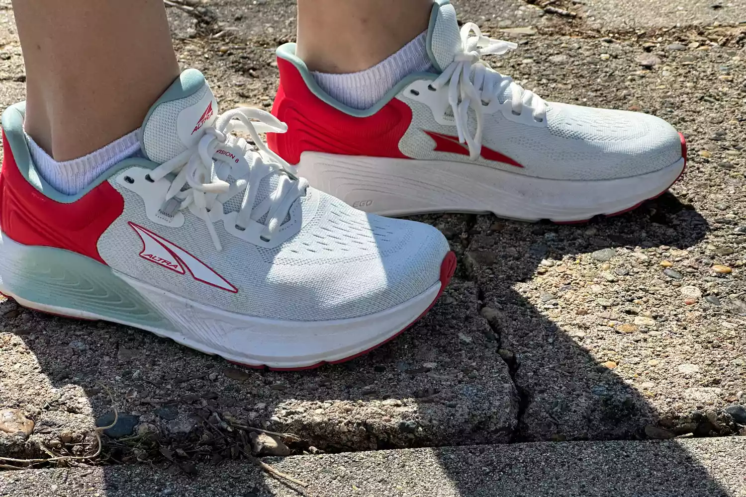 The side-view of the Altra Provision 8 Womenâs Support Road Running Shoes on stone