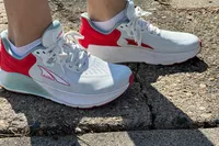 The side-view of the Altra Provision 8 Womenâs Support Road Running Shoes on stone