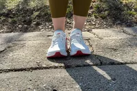 Two feet posed in the Altra Provision 8 Womenâs Support Road Running Shoes