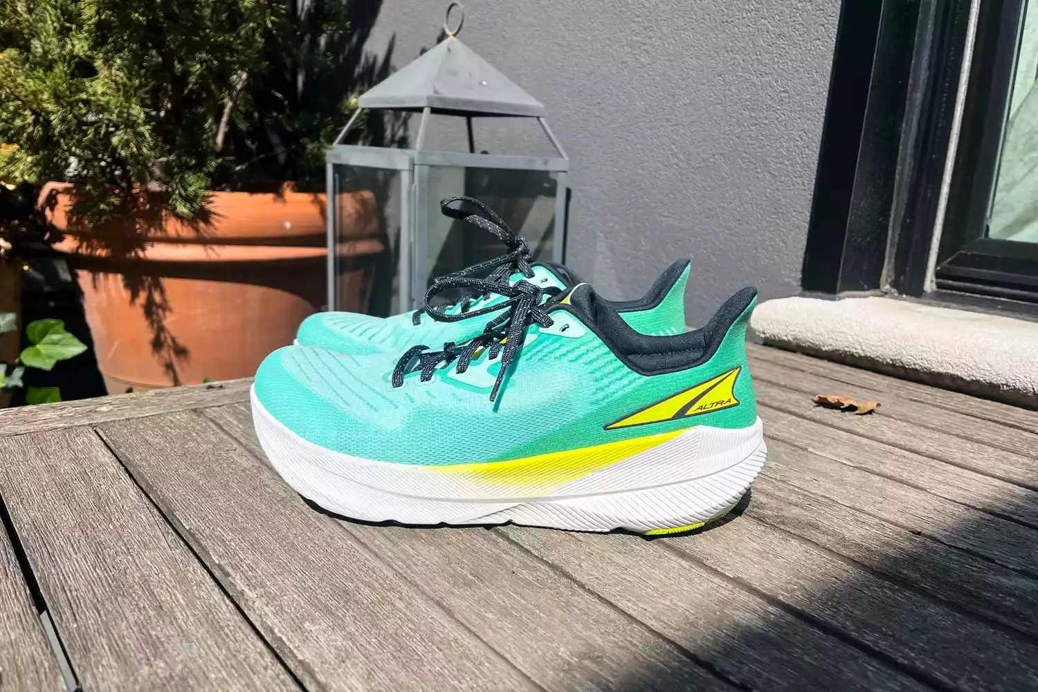 The Altra Running Experience Flow shoes on wood