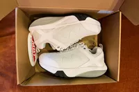 The MBT Womenâs Sport 4 II sneakers in a box