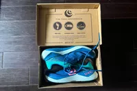 The Topo Athletic Womenâs Ultrafly 5 sneakers in a box