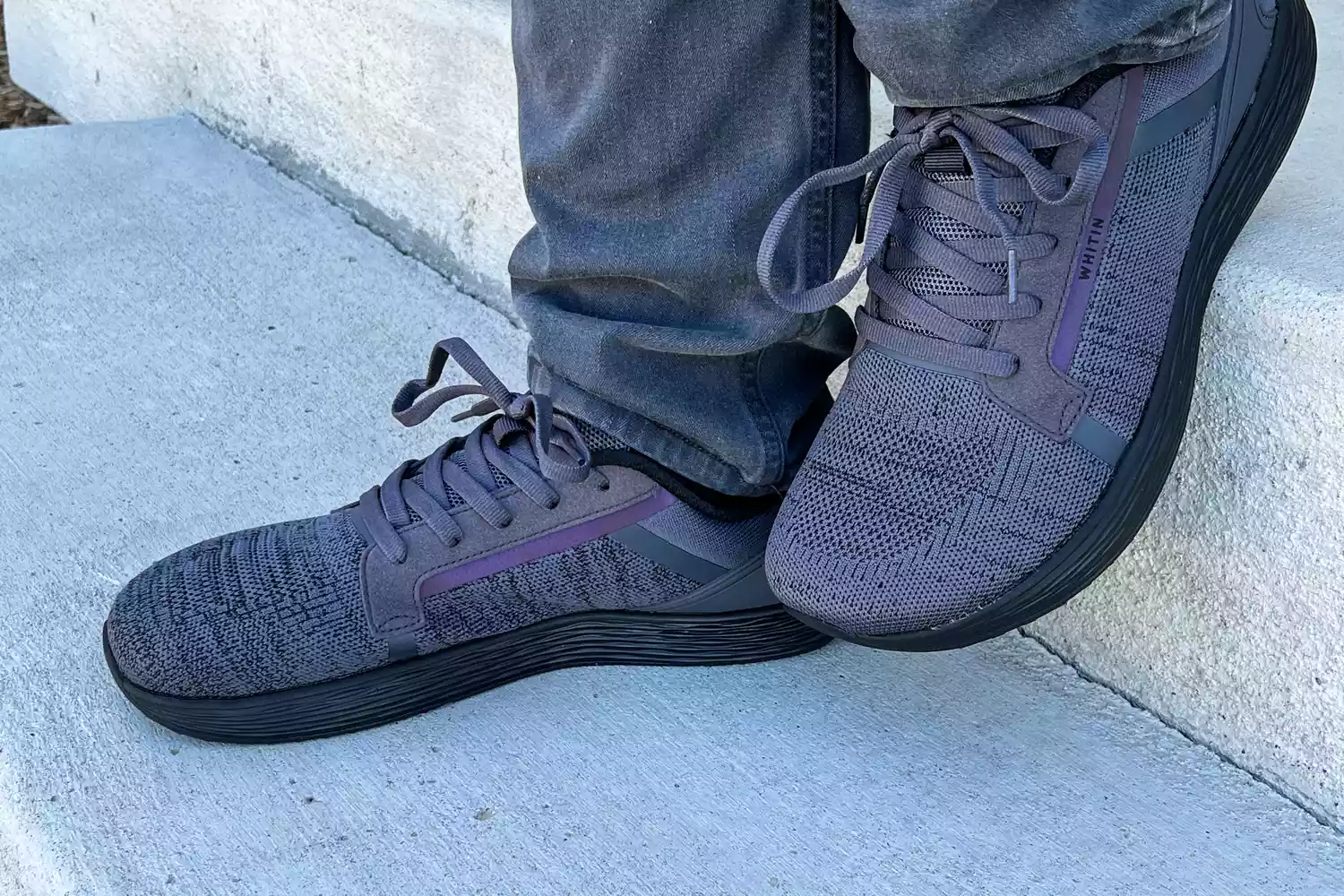 Two feet posed in the WHITIN Men's Wide Toe Box + Zero Drop Sole Road Running Shoes