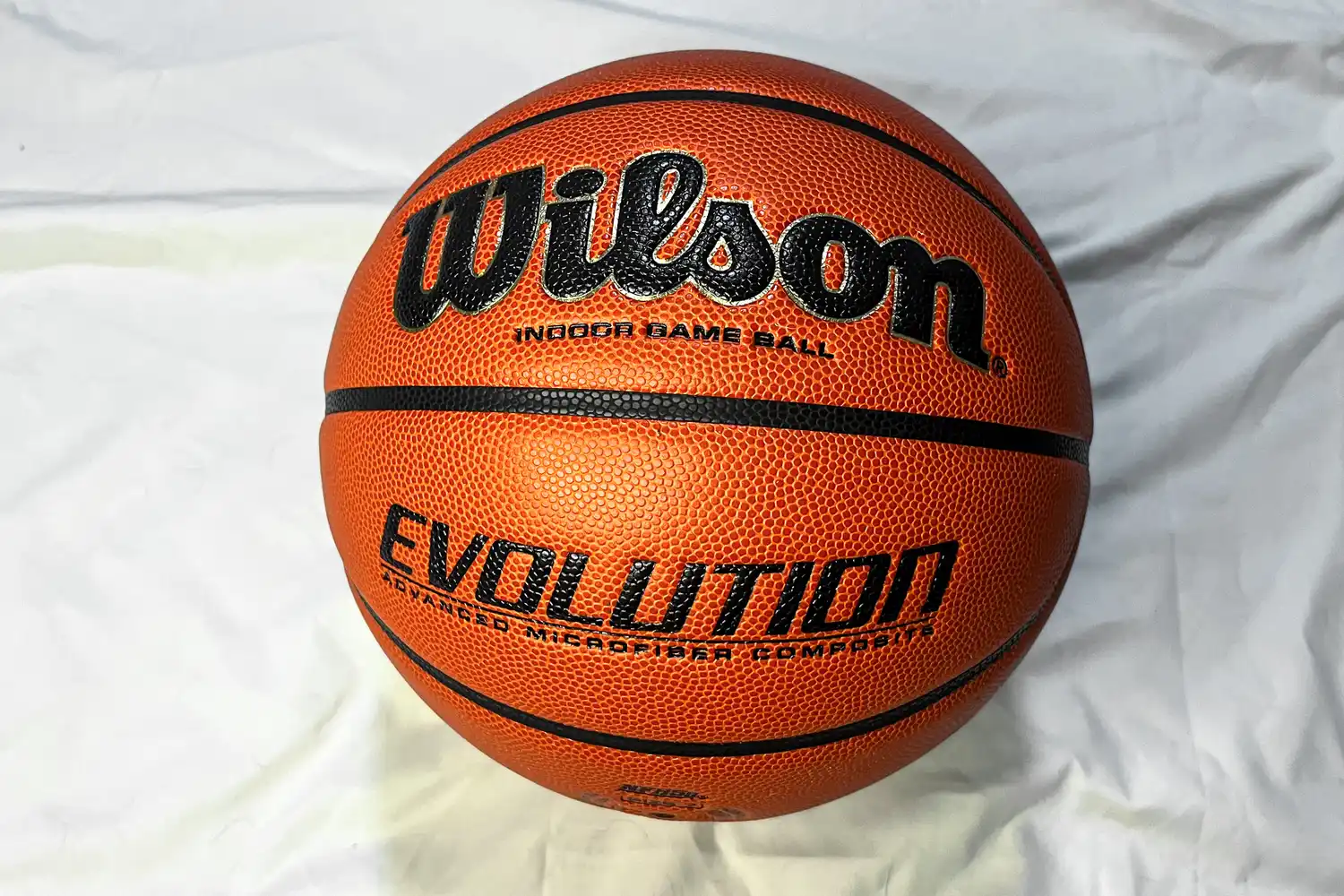 The front of the Wilson Evolution Game Basketball